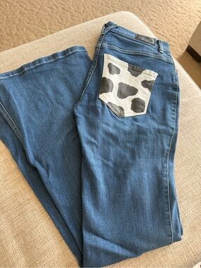 Express Blue Wide-Leg Jeans with Black & White Cow-Print Pocket